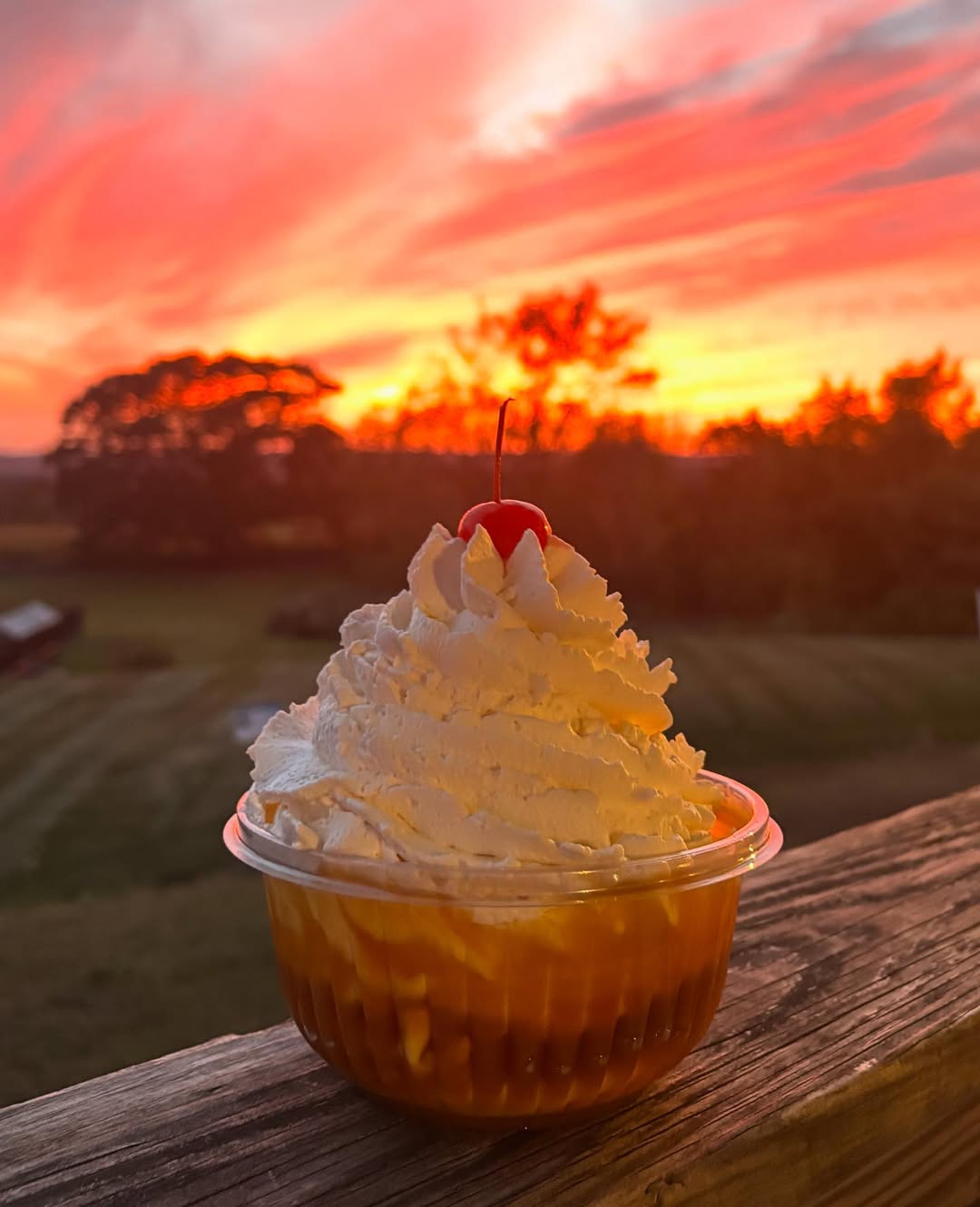 Ice cream cone with sunset backdrop