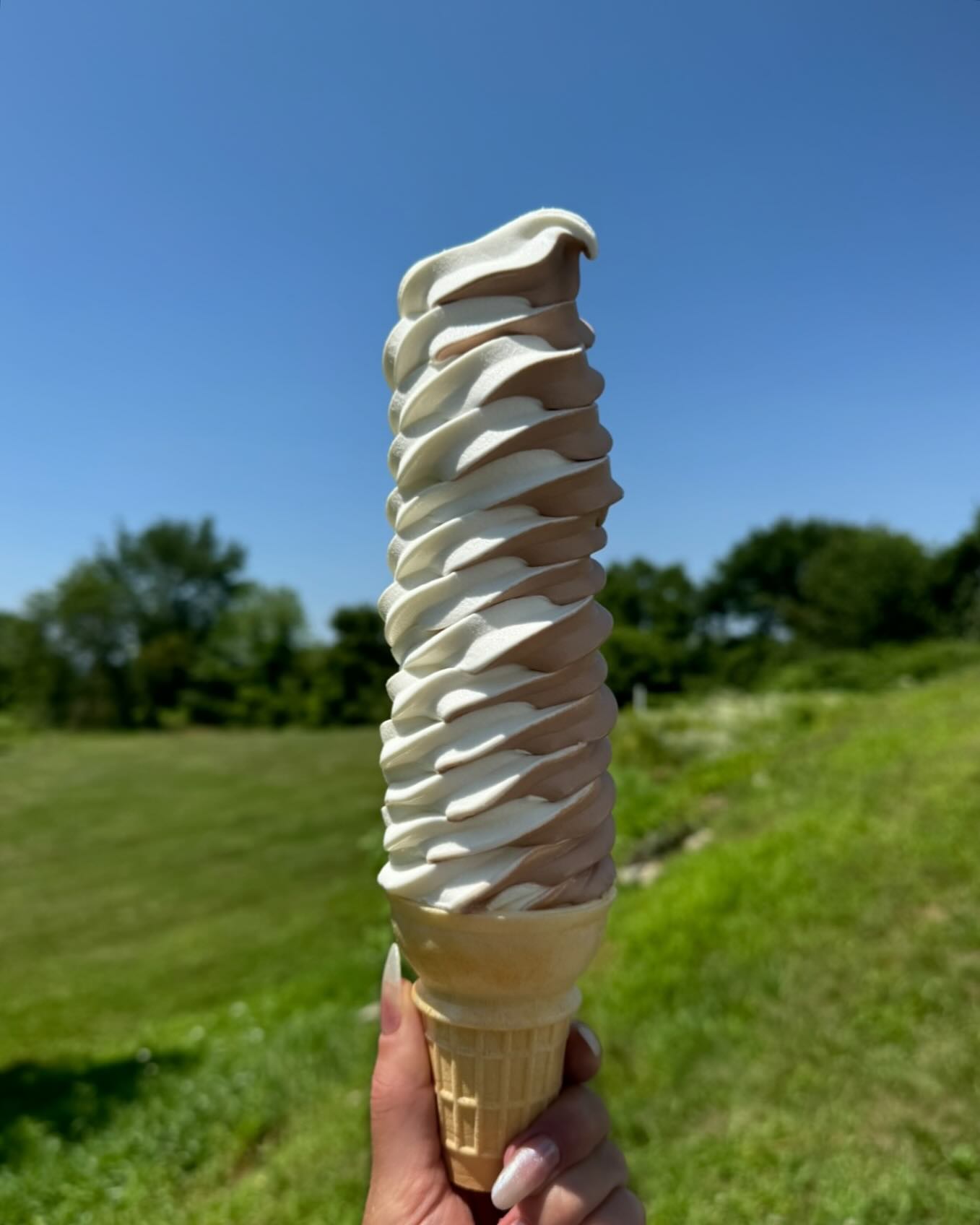 Towering soft serve ice cream cone