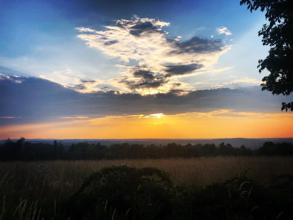 Golden-hour sunset over Dresser Hill